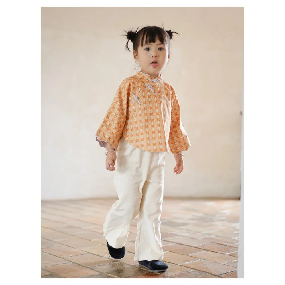 MaNa Girls' Cotton Top with Handmade Frog Buttons and Oversized Sleeves - Orange Print