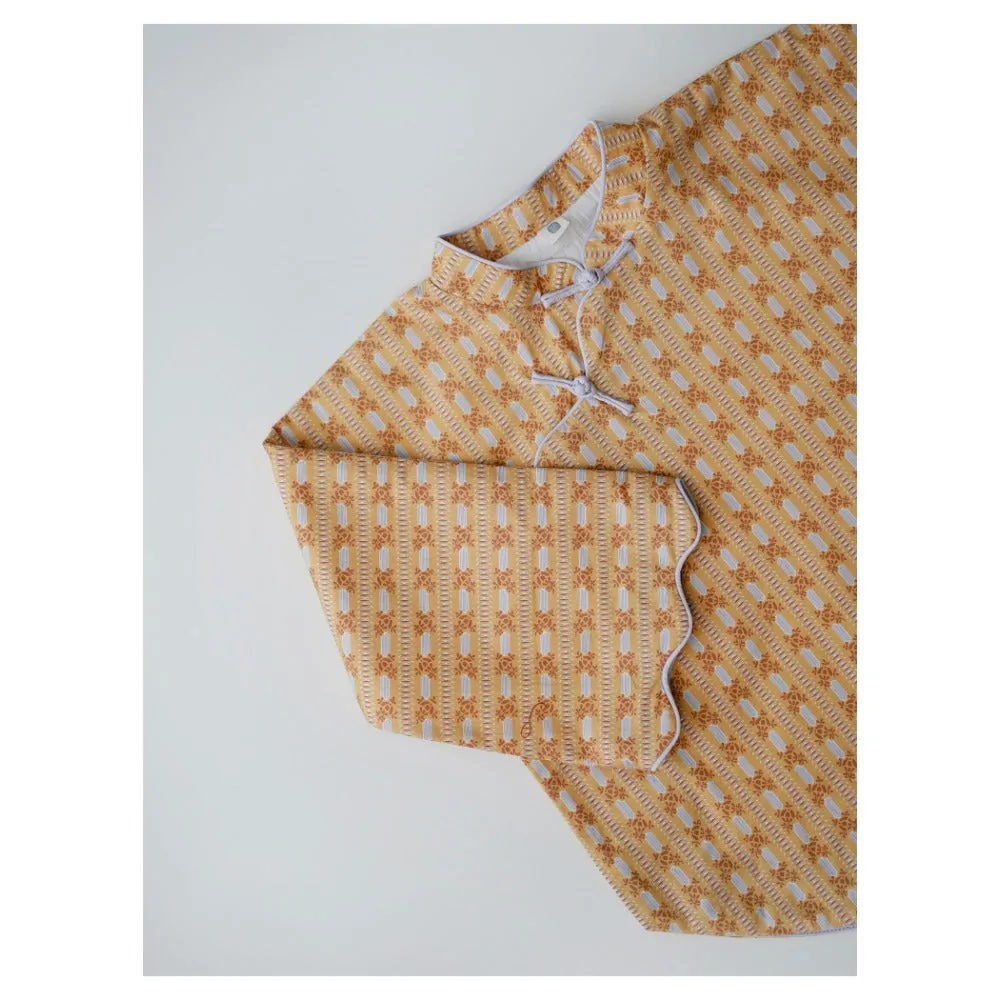 MaNa Girls' Cotton Top with Handmade Frog Buttons and Oversized Sleeves - Orange Print
