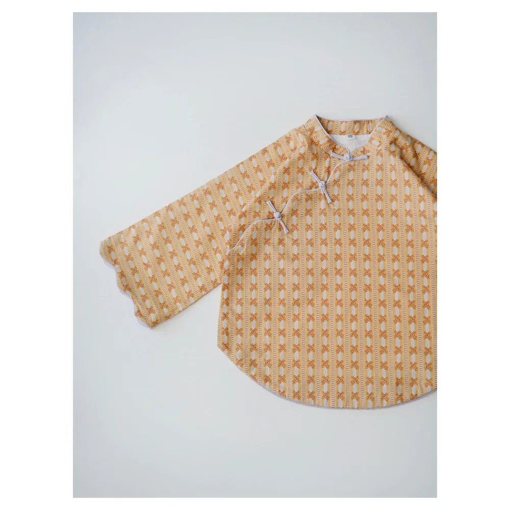 MaNa Girls' Cotton Top with Handmade Frog Buttons and Oversized Sleeves - Orange Print